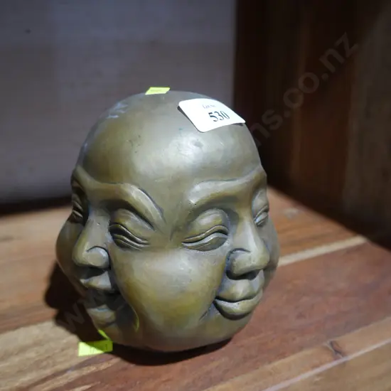 Four-faced Buddha sculpture