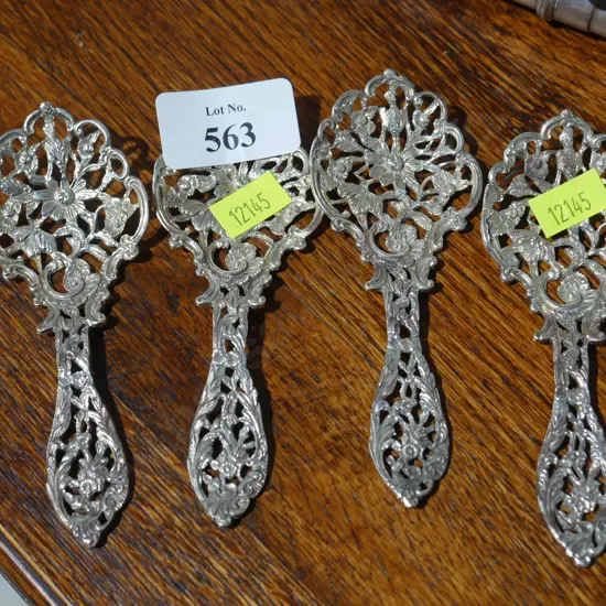 Four decoratives spoons