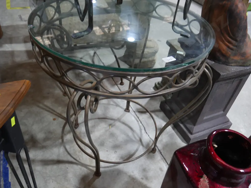 Wrought iron base glass top table Image 1++
