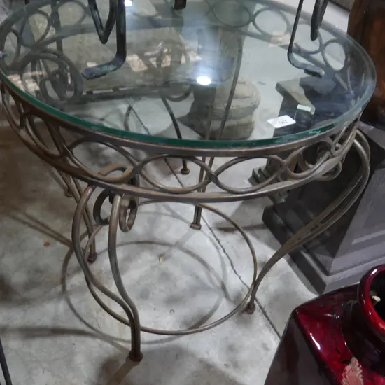 Wrought iron base glass top table