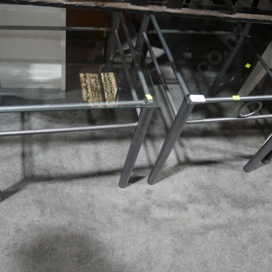 Two glass top occasional tables