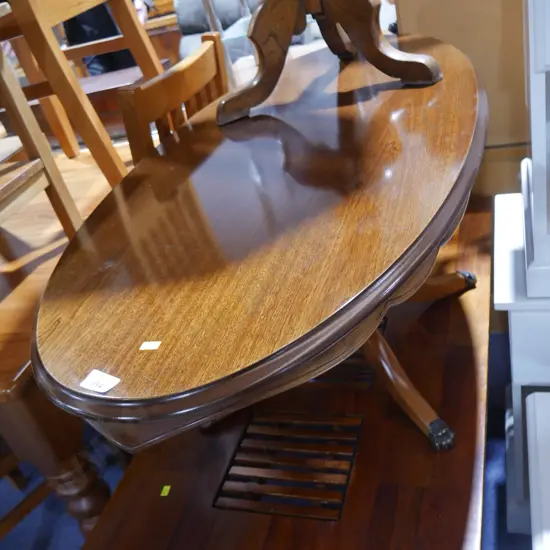 Oval mahogany coffee table