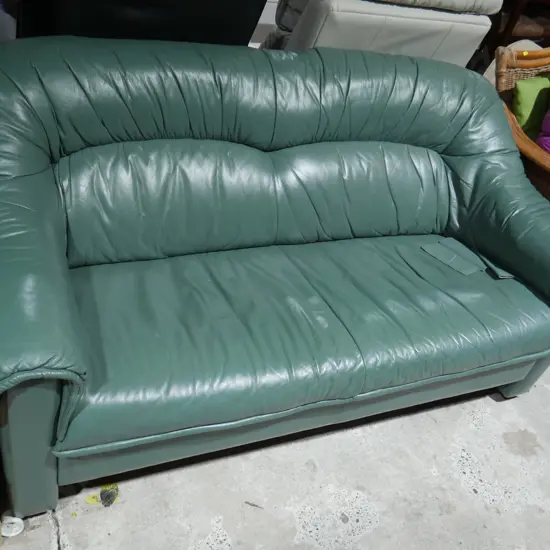 Green leather 2-seater sofa