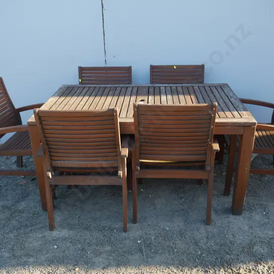 Wooden outdoor table and six chairs