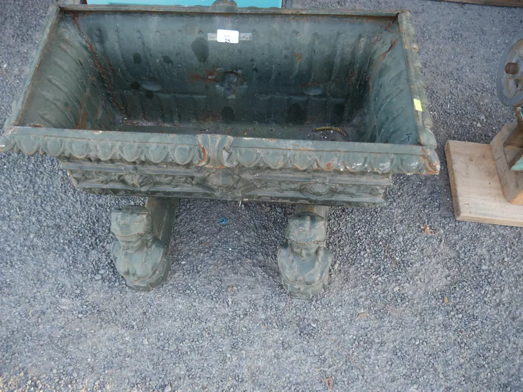 Green cast iron planter with stands Image 1++