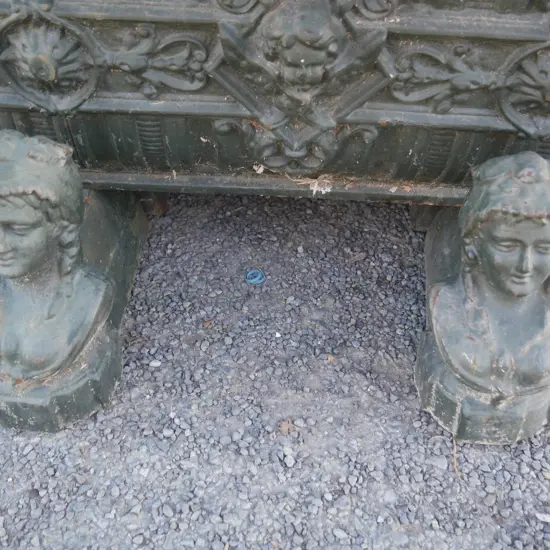 Green cast iron planter with stands