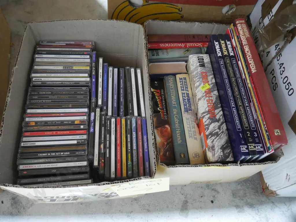2 boxes of CDs and books Image 1++