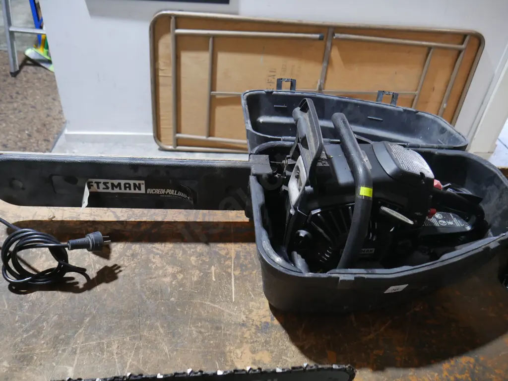 Craftsman chainsaw and case Image 1++