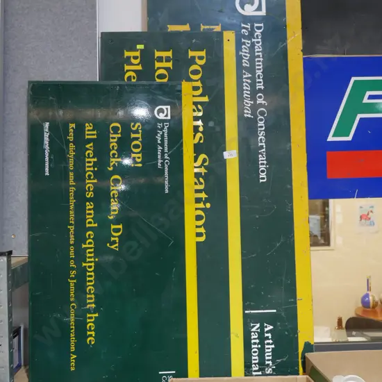 Three DOC signs