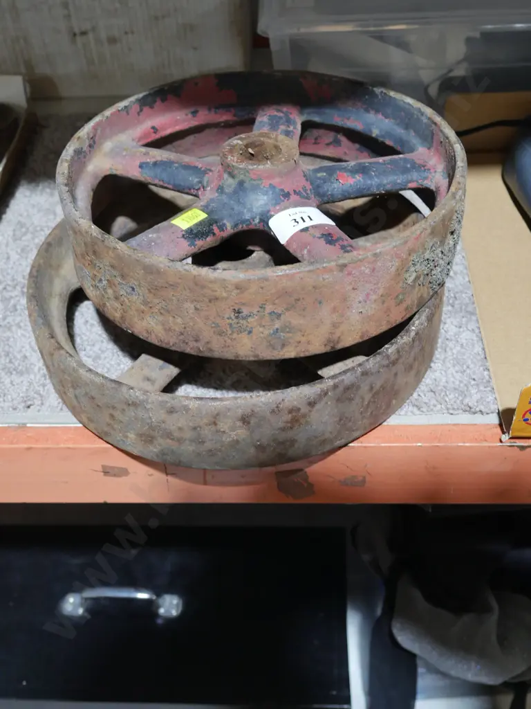2 cast iron wheels Image 1++