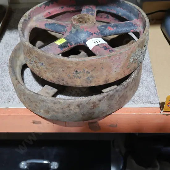 2 cast iron wheels