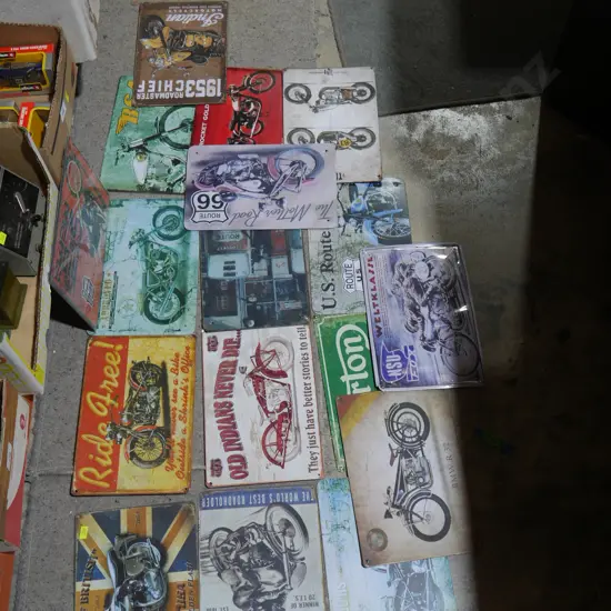 Assorted tin signs