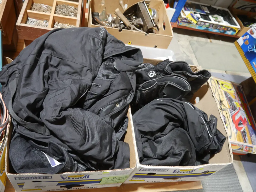Two boxes of motorcycle clothing Image 1++