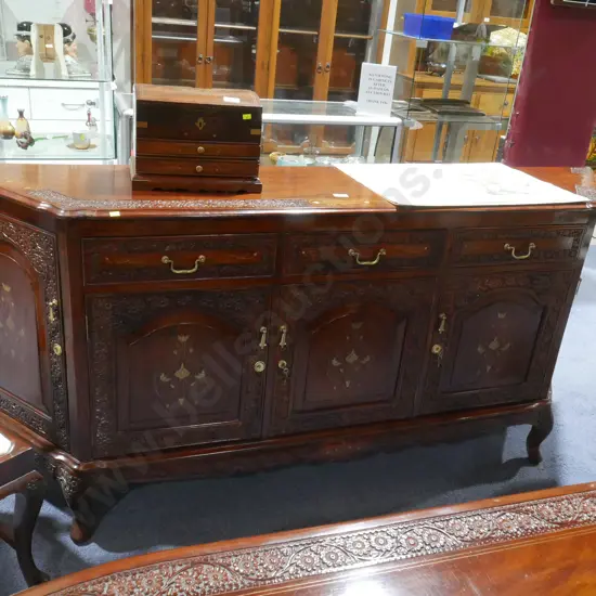 Ornate carved sideboard
