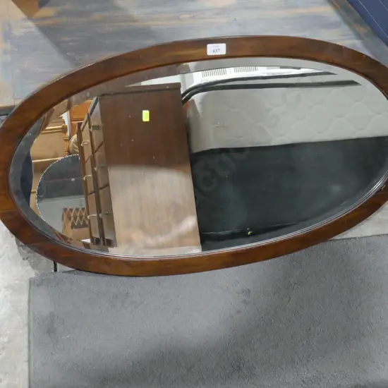 Oval wall mirror