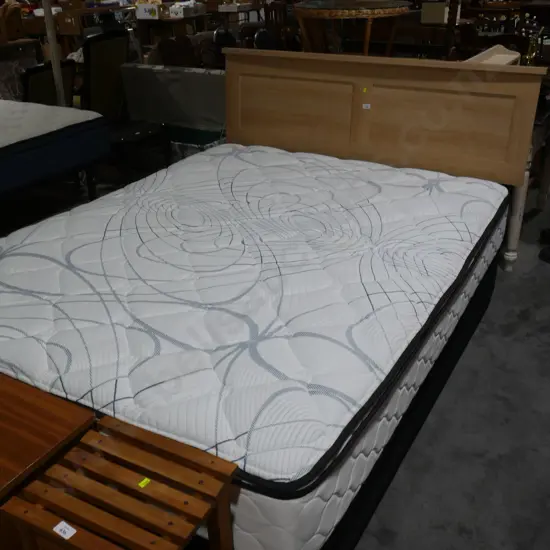 Double bed with headboard