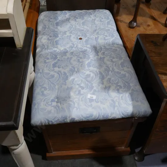 Wooden trunk with cushion