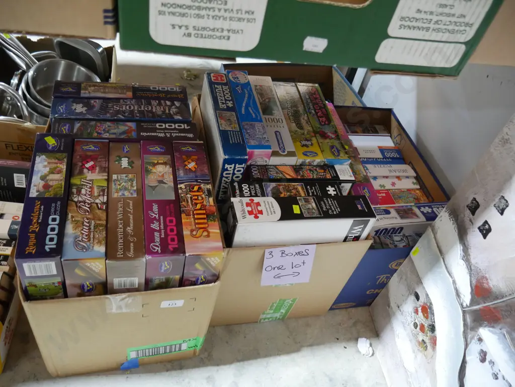 Three boxes of jigsaw puzzles Image 1++