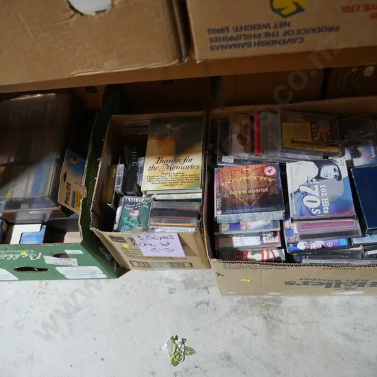Three boxes of CDs and cassettes