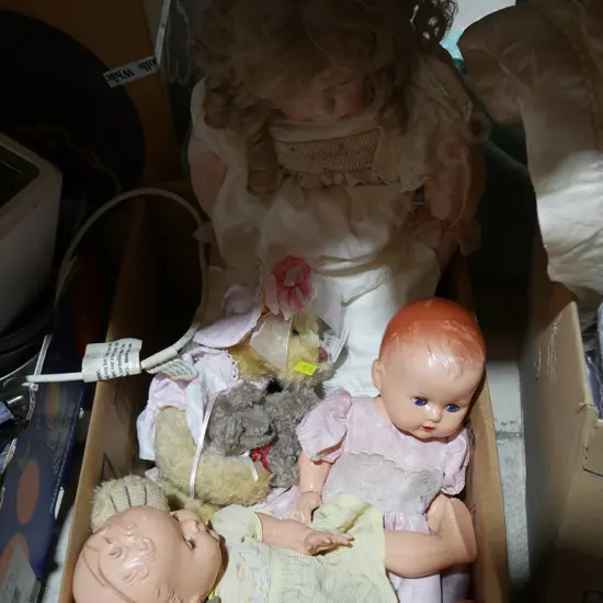 Box of dolls