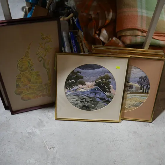 Assorted artwork in frames