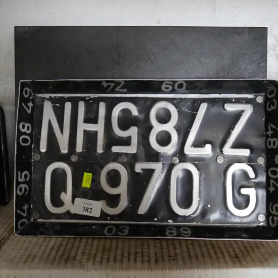 Number plate tray