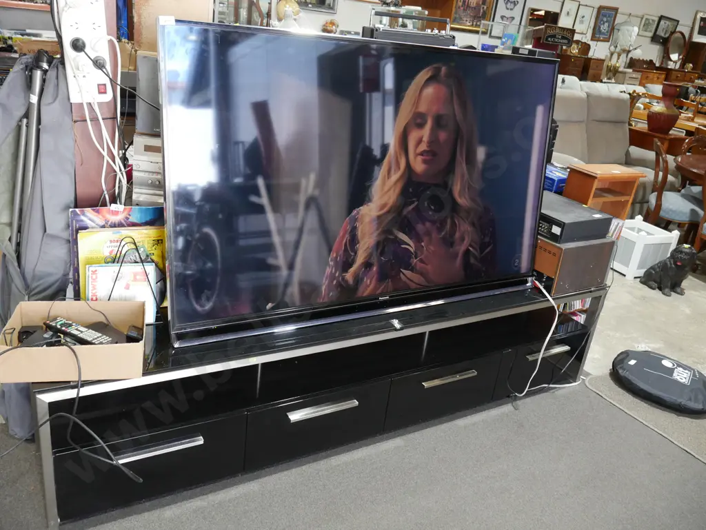 Panasonic TV and TV cabinet Image 1++