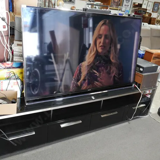 Panasonic TV and TV cabinet