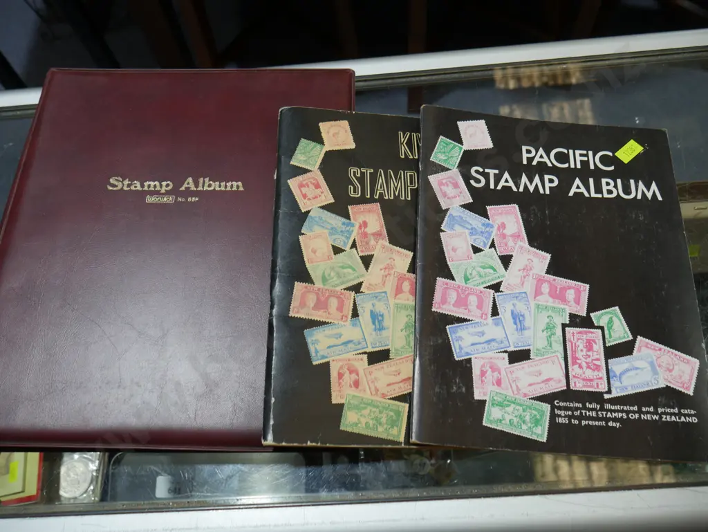 Three stamp albums Image 1++