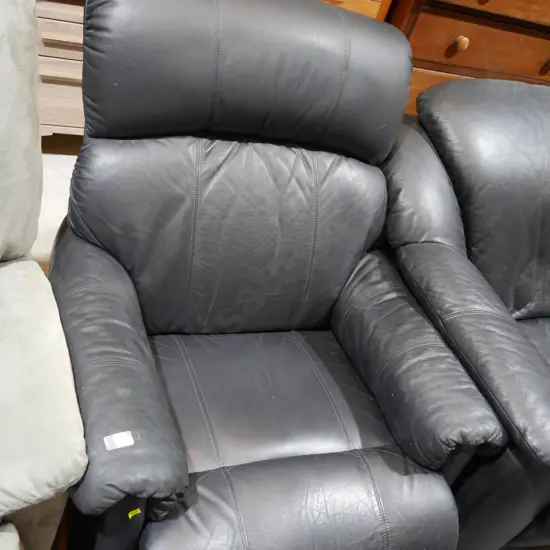 Black leather lazboy armchair