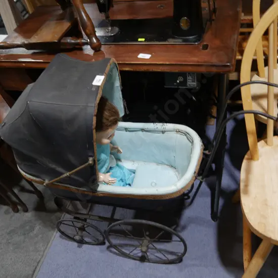 Vintage pram and Doll