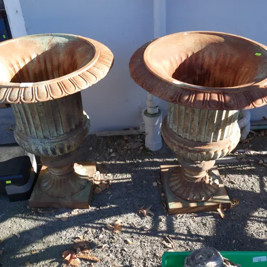 2 cast planter urns
