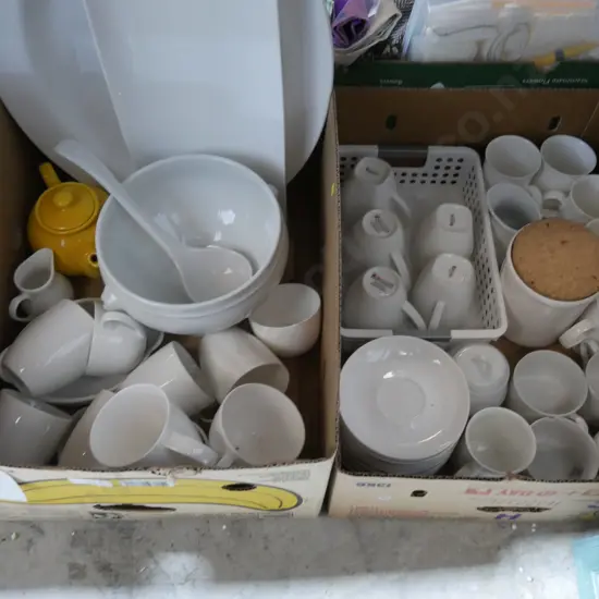 Two boxes of white dinnerware