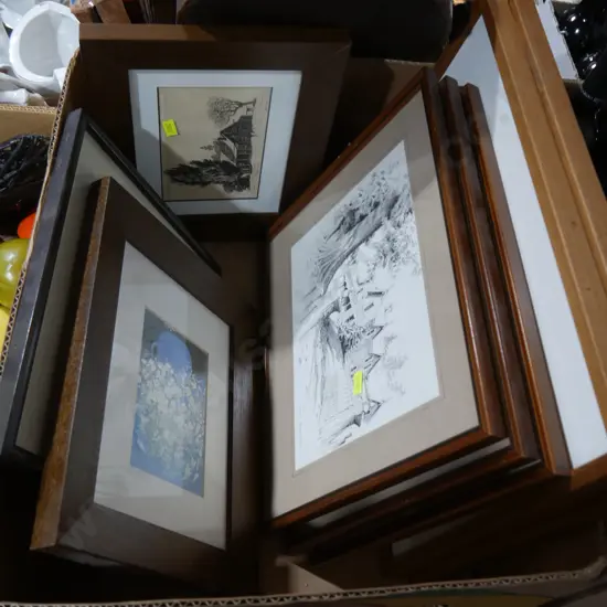 Box of pictures in frames