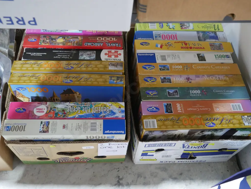 Two boxes of jigsaw puzzles Image 1++
