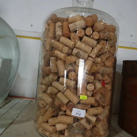 Glass container full of corks