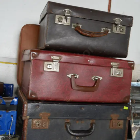Assorted vintage suitcases