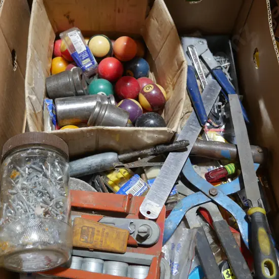 Assorted workshop tools and pool balls