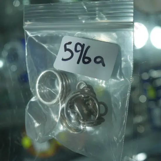 3 Sterling silver rings and necklace