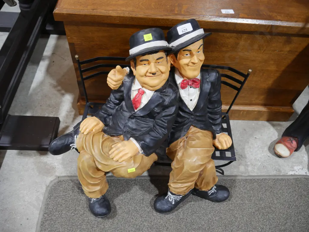 Laurel Hardy on a bench Image 1++