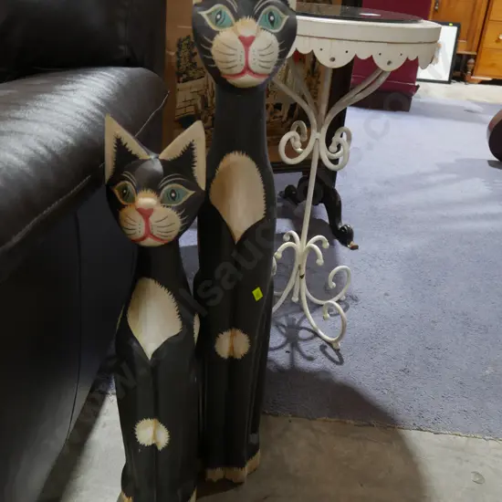 Two cat figurines