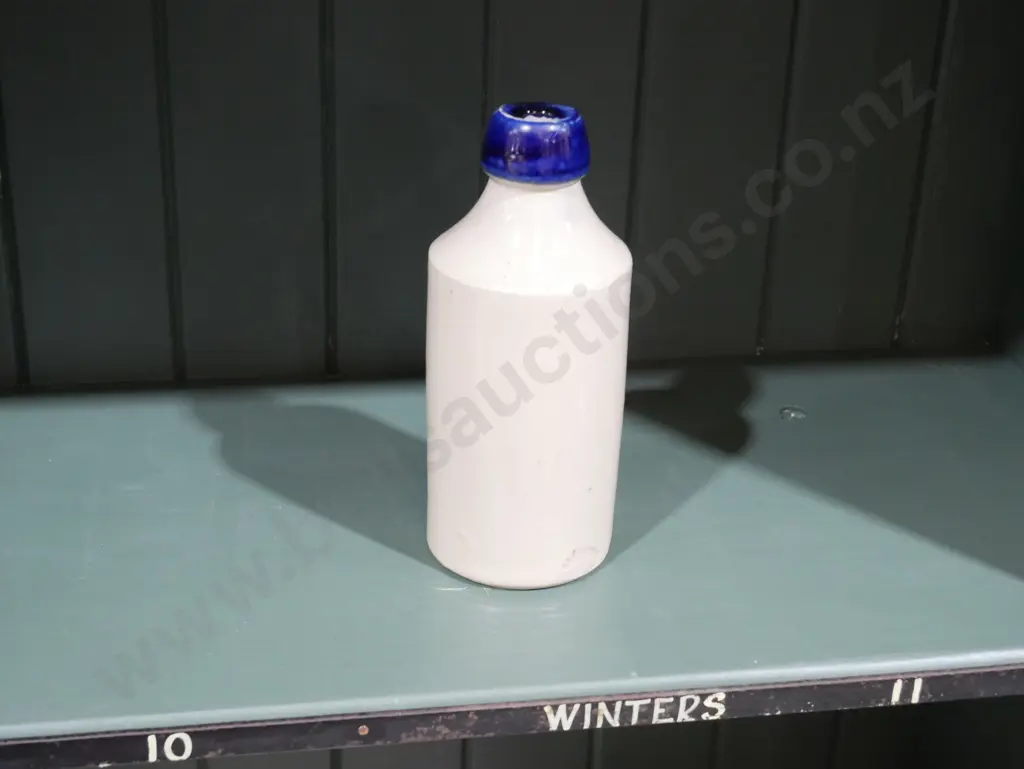 Blue lip ginger beer bottle, J Ladd Adelaide Image 1++