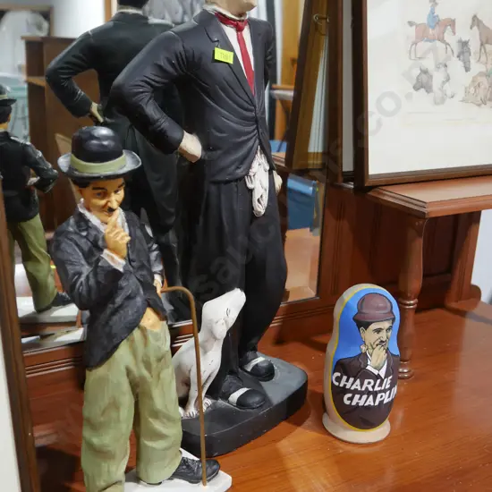 2 Charlie Chapman figurines, Russian dolls