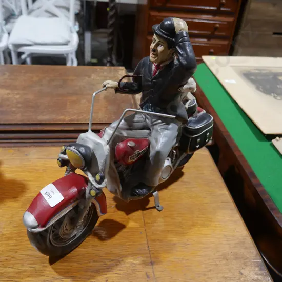 Charlie Chapman on a motorbike