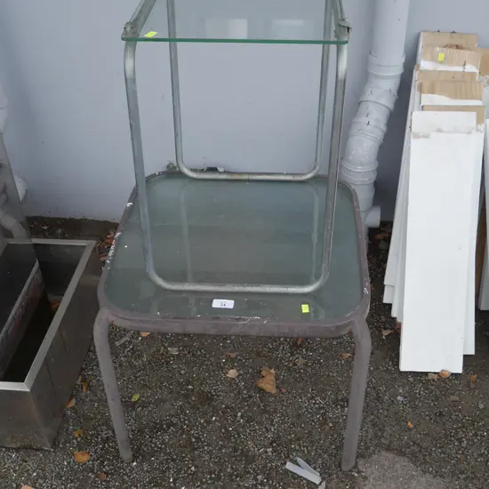 2 glass top side tables