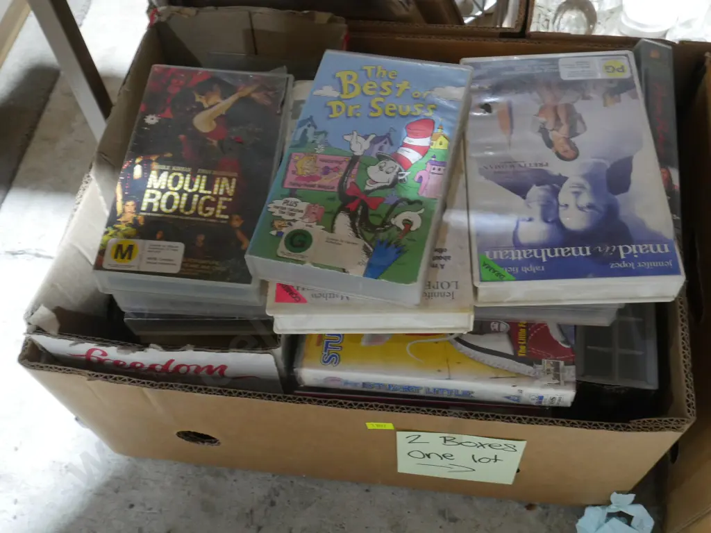 Two boxes of tapes, books etc Image 1++