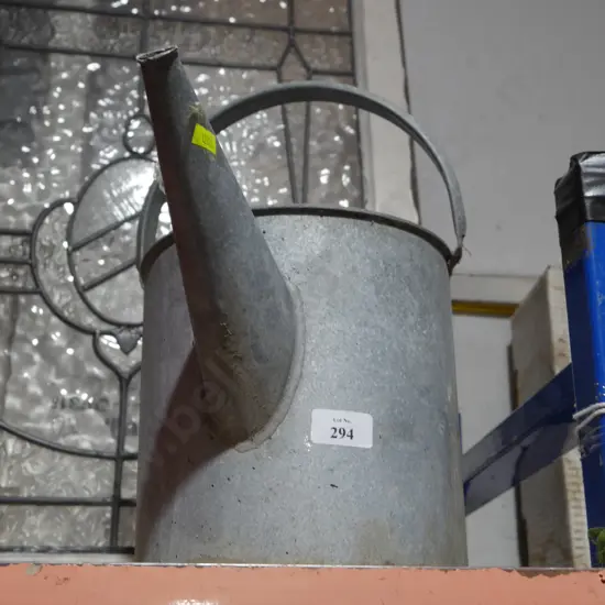 Tin watering can