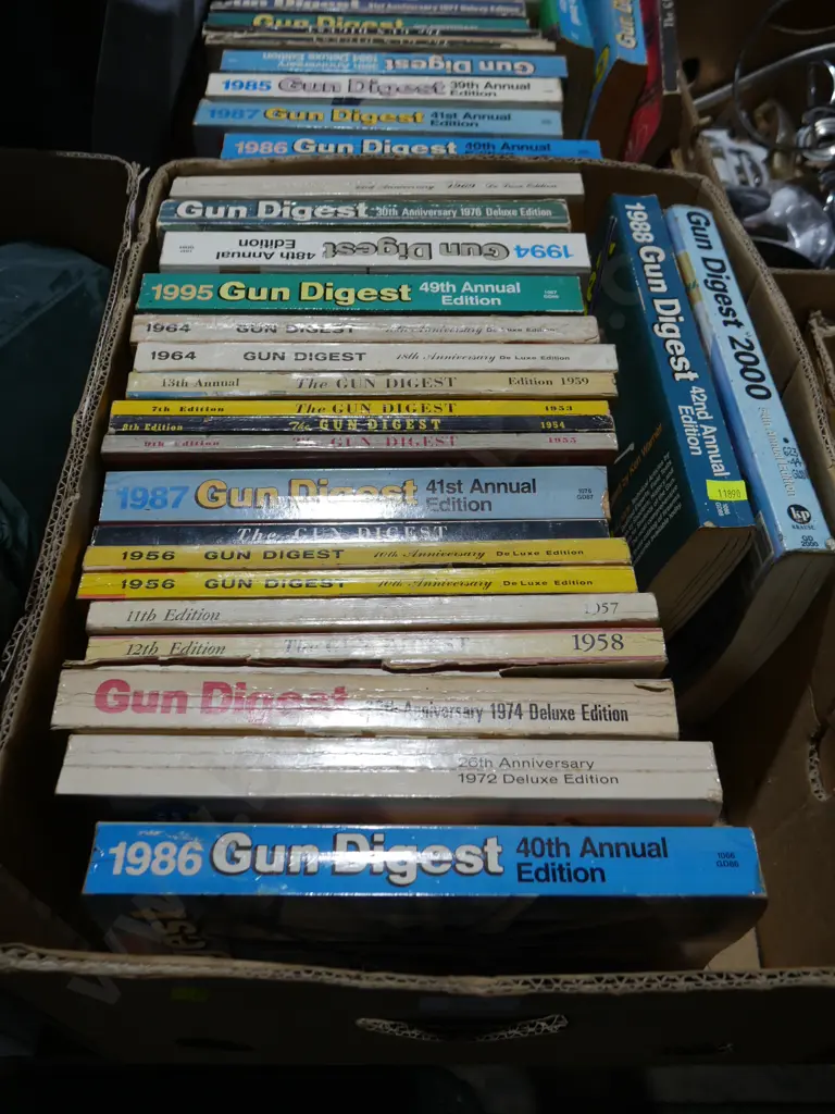 2 boxes of gun digest books Image 1++