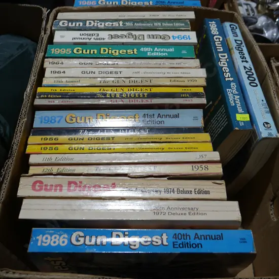 2 boxes of gun digest books