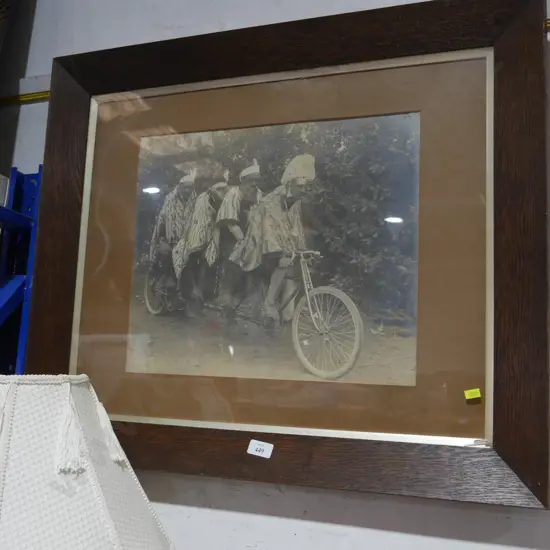 Early photo of Maori on quad tandem bike